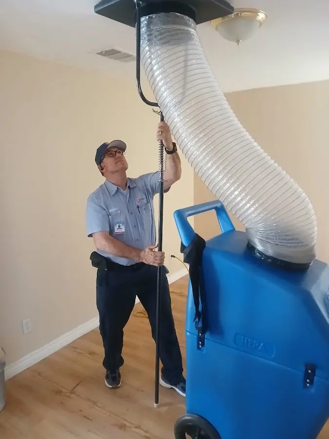 HVAC Installation technician using HEPA equipment in Palm Tree